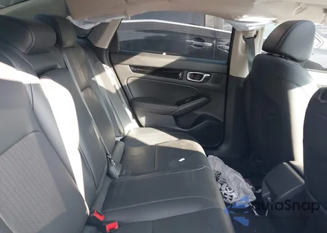 2023 Honda Civic Touring z USA, uszkodzony, nr VIN 2HGFE1F90PH304072